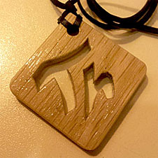 Carved personalized pendant made of oak wood